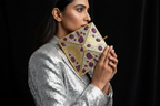 Gold Embellished Kundan & Ruby Stone Clutch