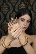 Ornate Gold-Toned Bangle with Colorful Stones