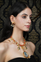 Traditional Golden Coral Necklace with Deity Pendant